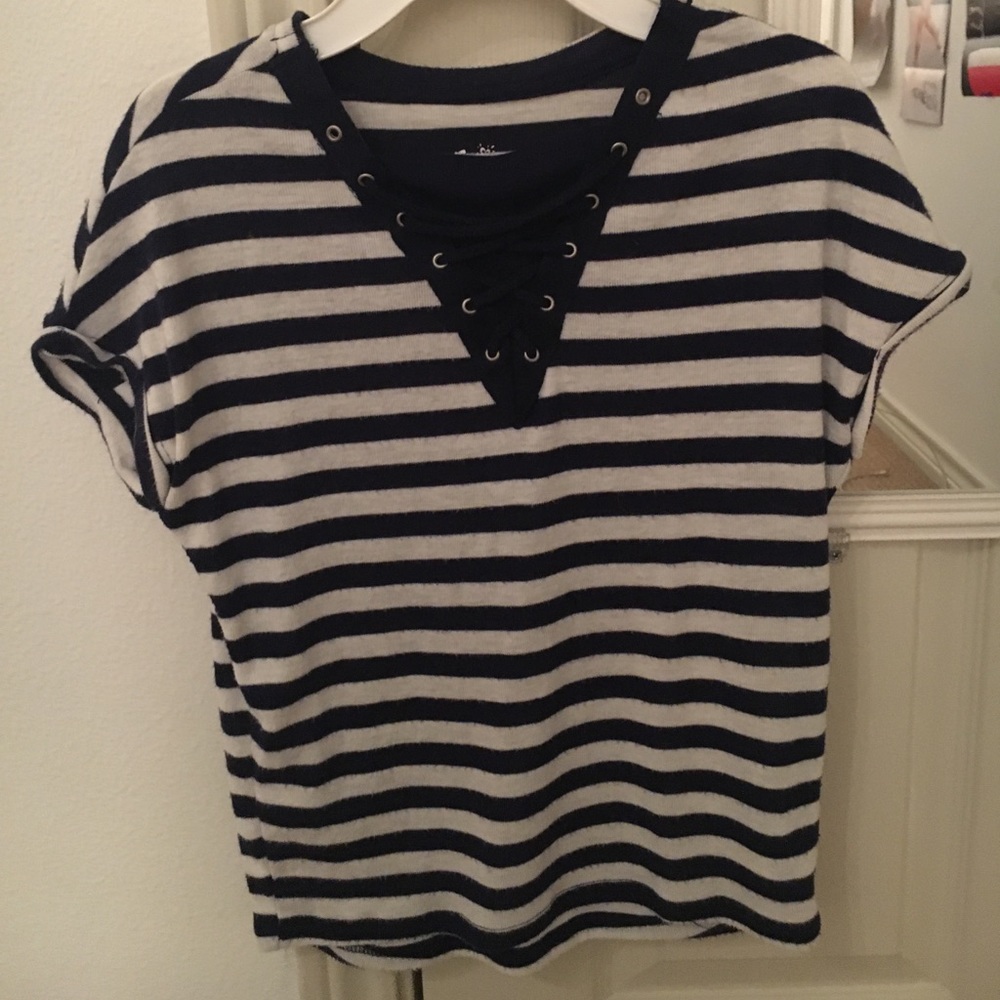 Blue and Black striped T-shirt.